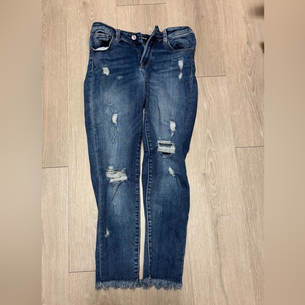 Distressed Blue Jeans